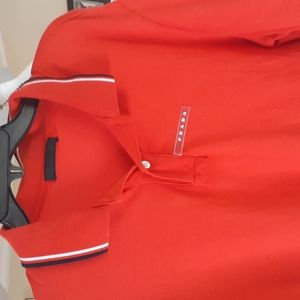 Prada burnt orange Polo shirt.
